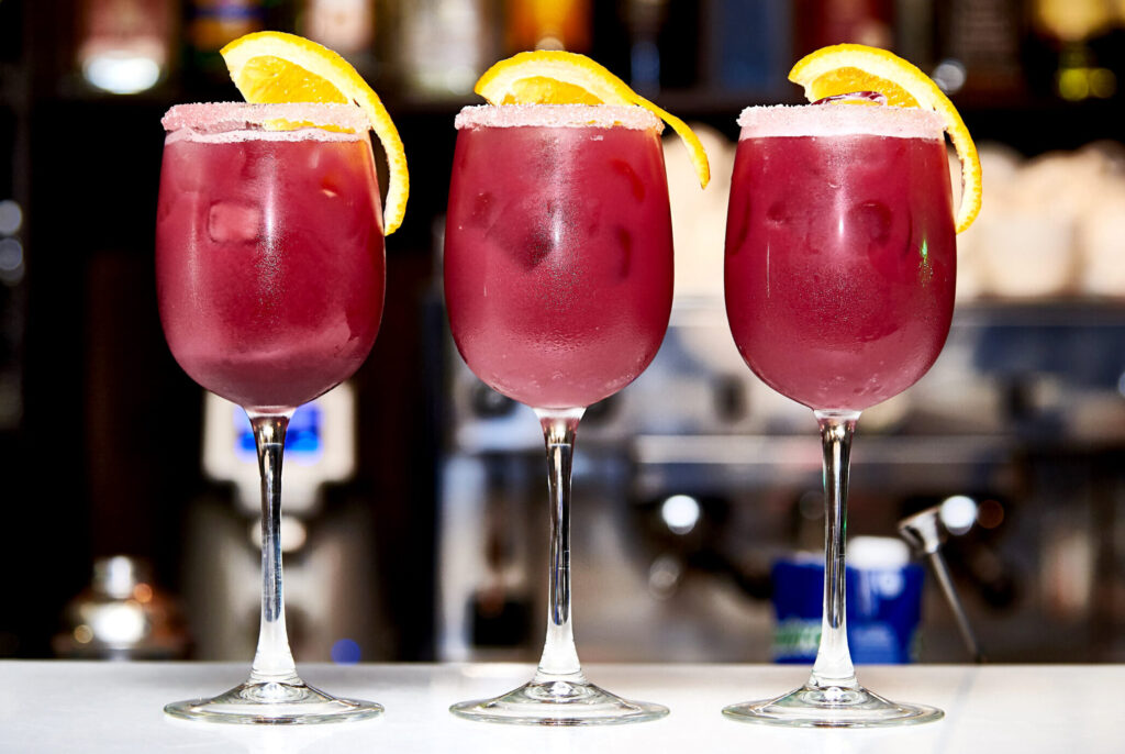 Cold red cocktails on the bar counter